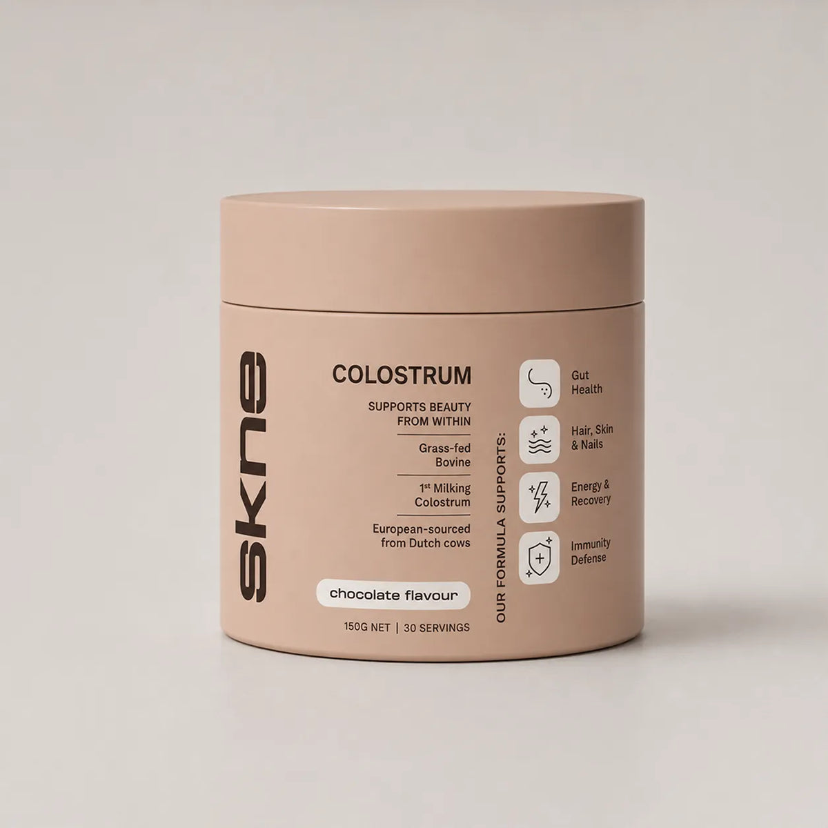SKNE chocolate colostrum tub label design in blush, with custom benefit icons for gut, skin and energy