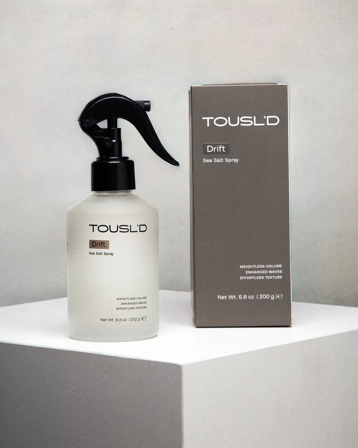 Tousl’d Drift salt spray bottle with its custom box, studio product shot