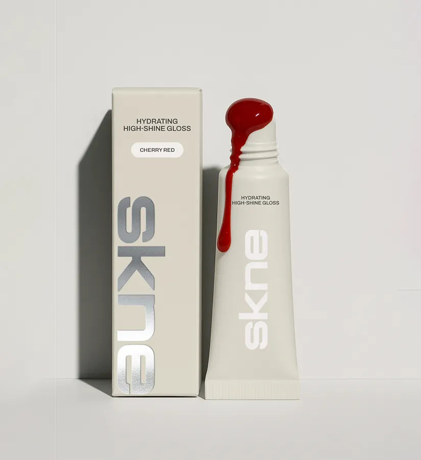 SKNE Cherry Red hydrating high-shine gloss, tube and carton packaging design